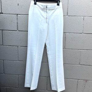 Tahari cream color dress pants. With faux pockets on the back.  NWT